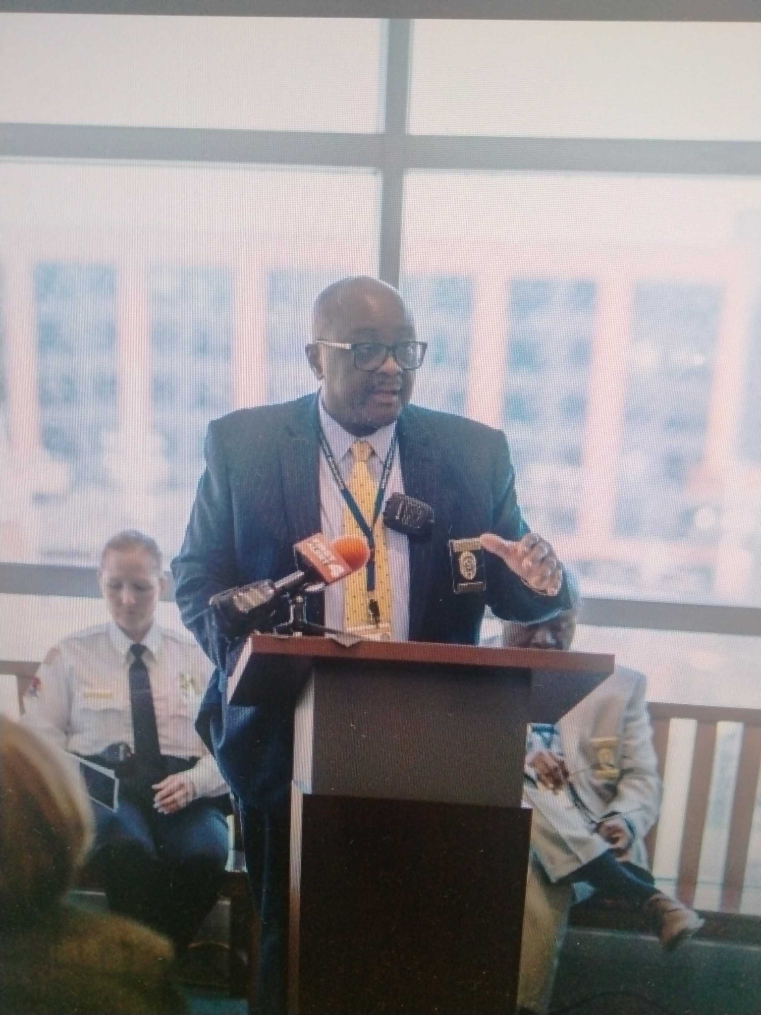 Speaking at podium
